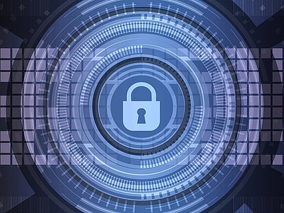 Ein von zahlreichen umkreisten Kreisen umgebenes Vorhängeschloss symbolisiert Cybersecurity